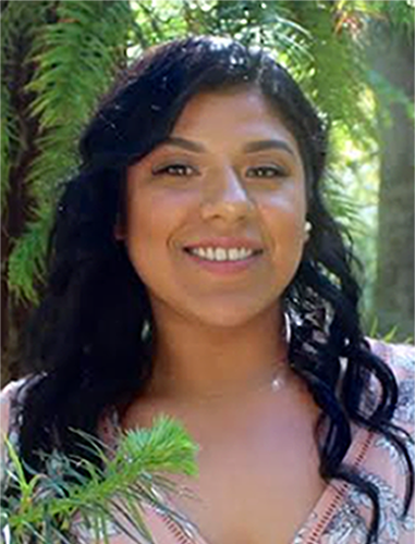 Headshot of Vickie Medina, Licensed Clinical Social Worker, smiling.