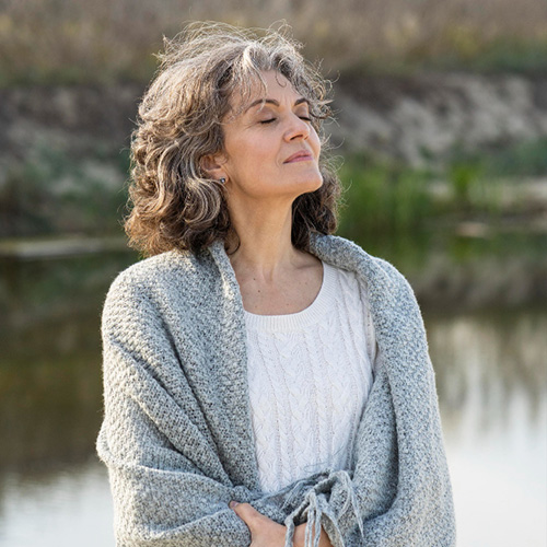 Pensive woman looking relaxed